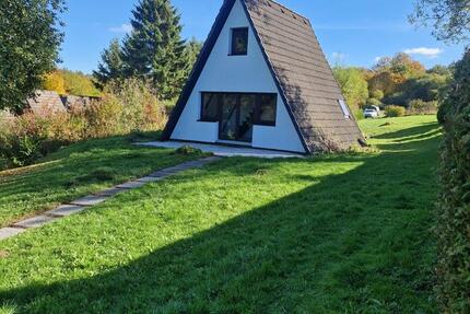 Schönes Nurdachhaus in der Natur zimmer