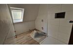 Umfangreich sanierte DG-Wohnung mit Loggia in BI-Brake
