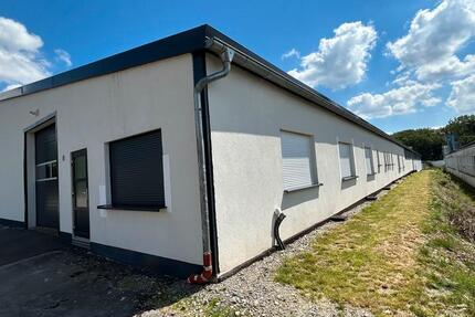 570 m² Warmhalle mit Büro-Sozialräumen und Stellplätzen zimmer