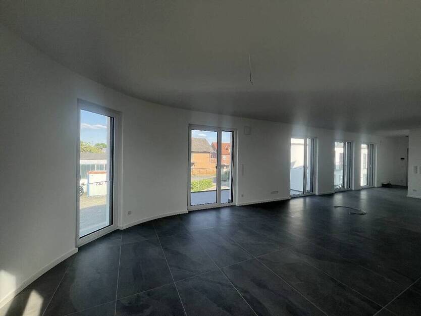 Hochwertige und energieeffiziente ObergeschossWohnung mit Balkon, Aufzug und Tiefgarage