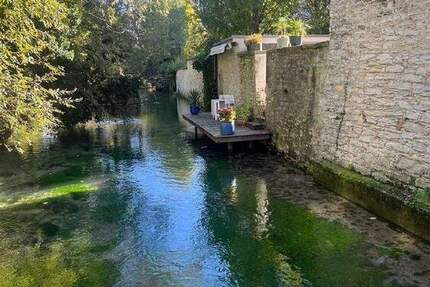 Geschichte trifft Idylle - Wohnen am Wasser im Denkmal 2 zimmer