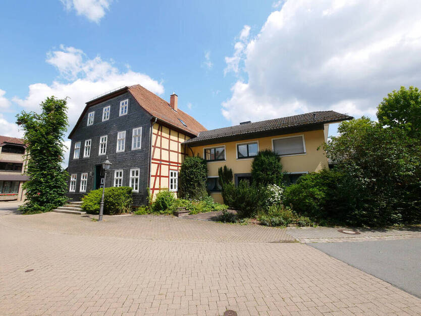 Doppelte Investition: Mehrfamilienhaus mit Gewerbe + Einfamilienhaus