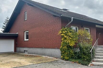 Zweifamilienhaus mitten in De zimmer
